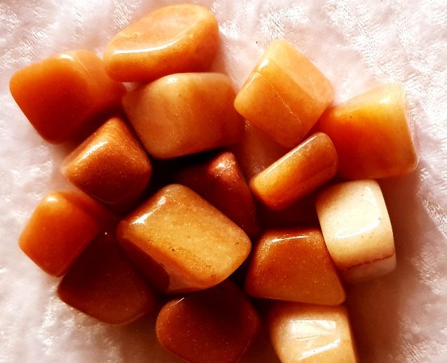 Aventurine, light red, tumbled stone
